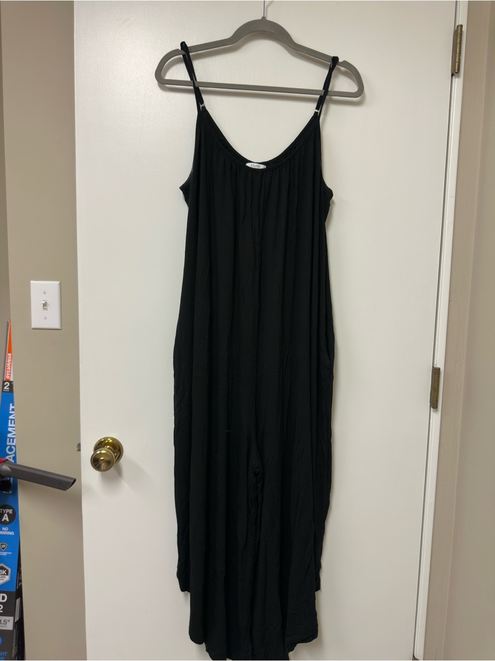 Women's black sleeveless garment neckline